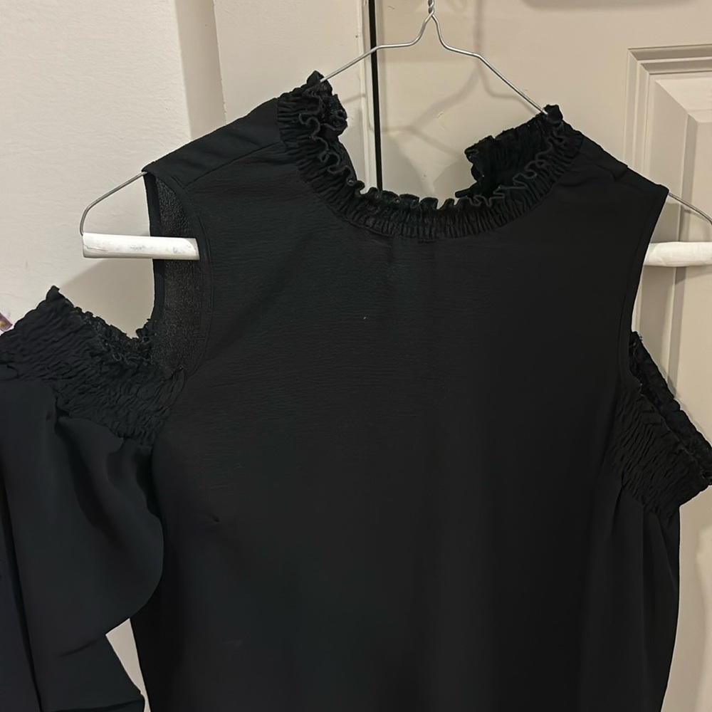 Cold shoulder cut out ruffle blouse